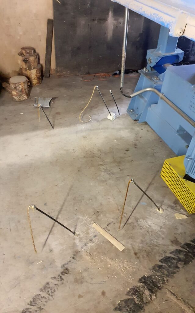 Geopolymer injection tubes installed for foundation reinforcement prior to injection