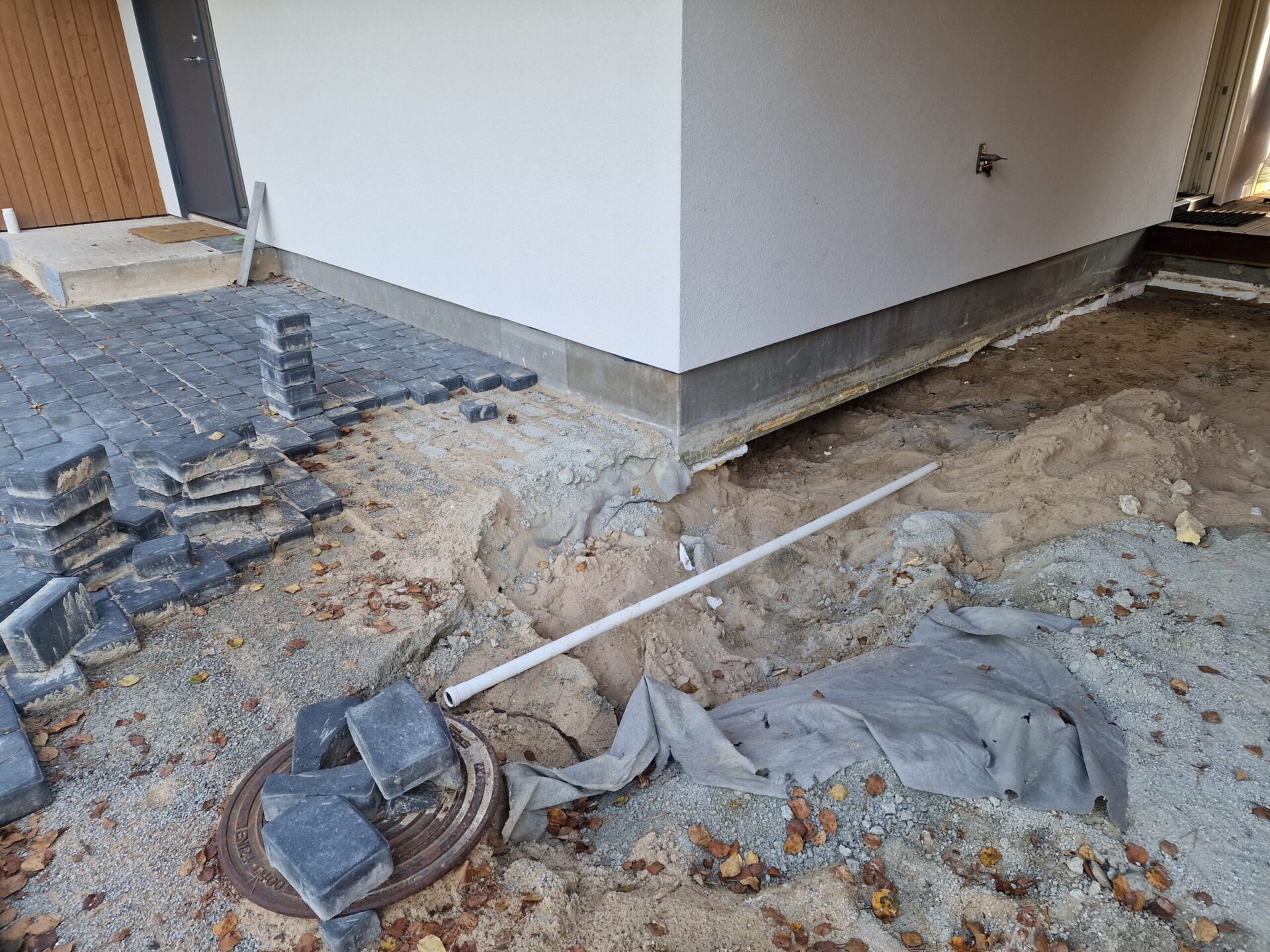 Foundation reinforcement works exposing subsoil along building perimeter prior to geopolymer injection