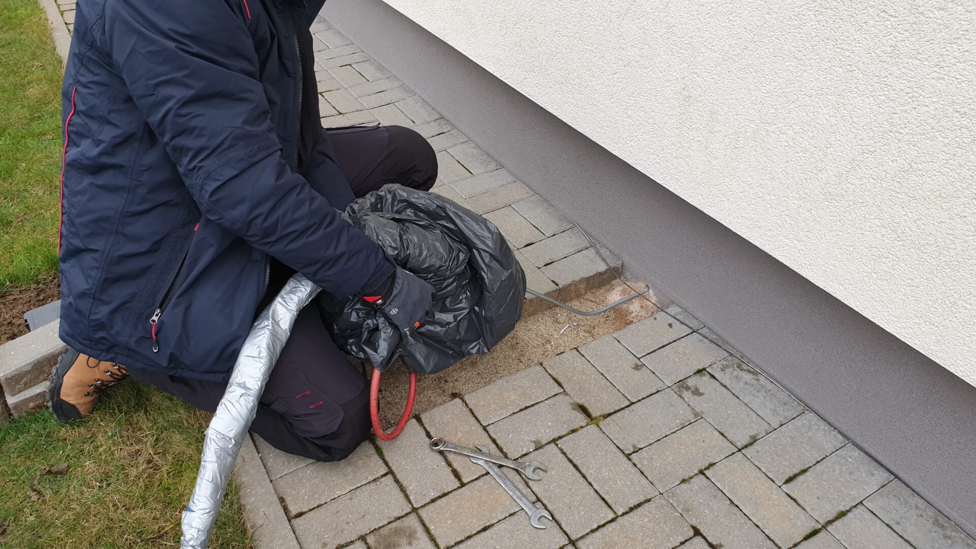 Geopolymer injection process for floor and foundation stabilization at a residential building